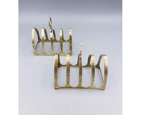 A pair of silver toast racks, Birmingham 1936 R &amp; Co.