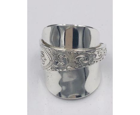 A solid silver spoon ring made from Antique cutlery by an Artisan. Successful bidders can notify of the size that they want a