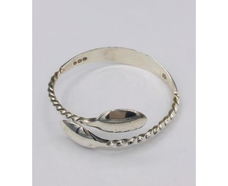 A Hallmarked silver bangle, Artisan made from silver spoons