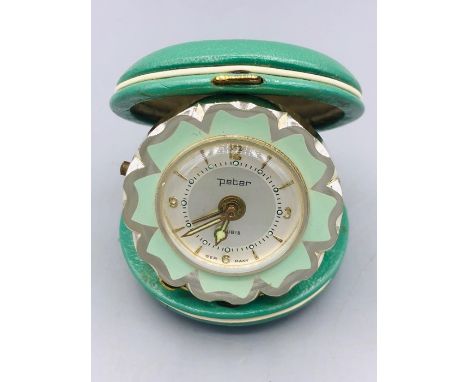 A Travel Alarm clock 