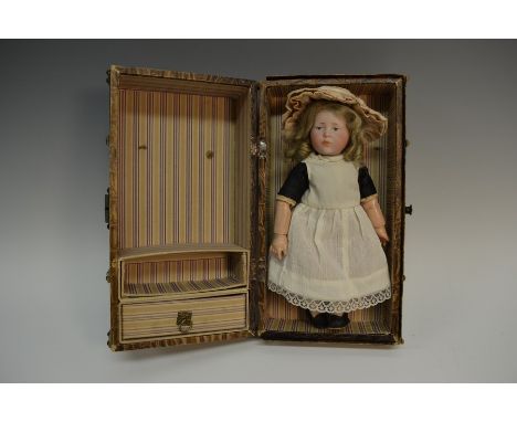 A Kammer & Rheinhardt 101 bisque head jointed bodied composition character doll, blue painted eyes, painted features, moulded
