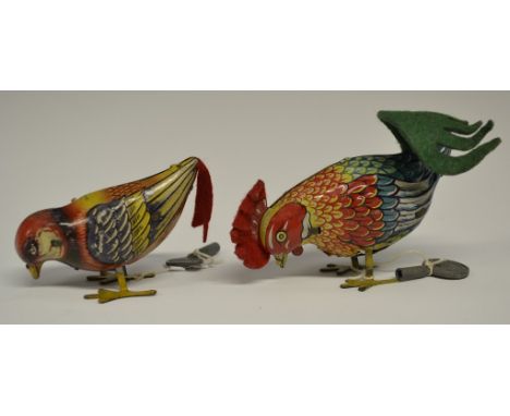 A Chad Valley  tin plate clockwork wind up pecking cockrel, in colours, 6.5cm high, c.1930;  a similar Prectyn pecking bird (