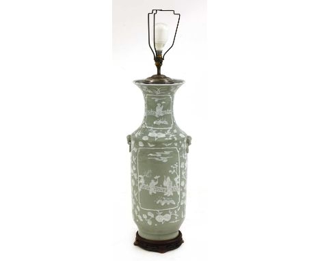 A Chinese-style celadon glazed ceramic table lamp,20th century, of baluster shape, the body set with a pair of taotie mask ha