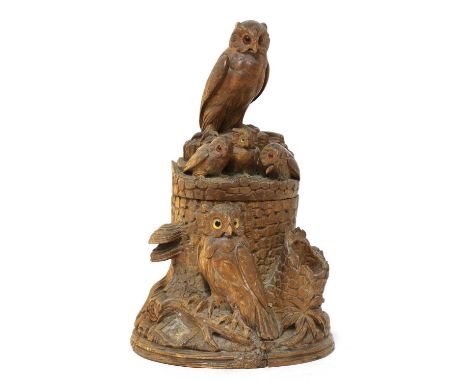 A Black Forest carved softwood tobacco box and cover,late 19th century, the cover with an owl and three owlets, the box in th