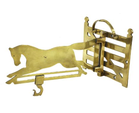 A brass chimney crane, 19th century, in the form of a horse and gate, with an adjustable swing arm and sliding hook,21cm wide