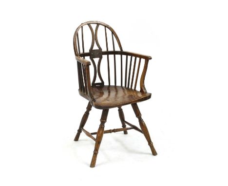 An unusual ash and elm Windsor chair, early 19th century, with a hoop back over a dished seat, raised on turned legs united b