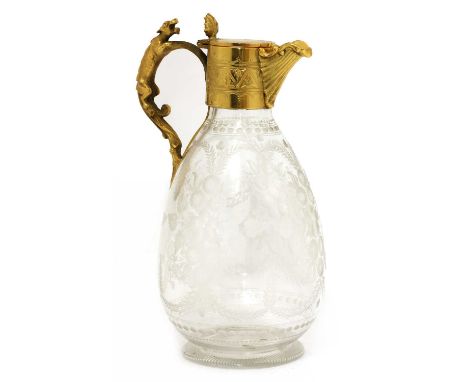 A Stourbridge engraved glass claret jug,late 19th century, the ovoid body well-worked with flowering foliage and swags below 