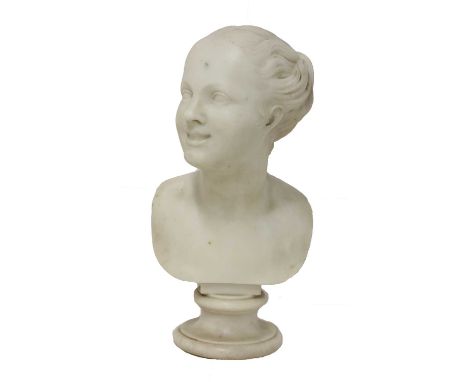 A white marble bust of a smiling young girl,19th century, with flowing swept-back hair, and raised on a turned socle base,42c