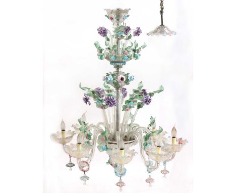 An impressive Murano chandelier,20th century, having eight lights on scrolled arms, coloured glass flowers and leaves, and an