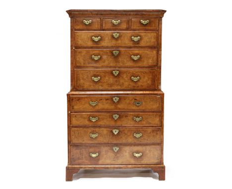 A George I walnut secretaire chest on chest, in two parts, the upper fitted with three short above three long drawers, flanke