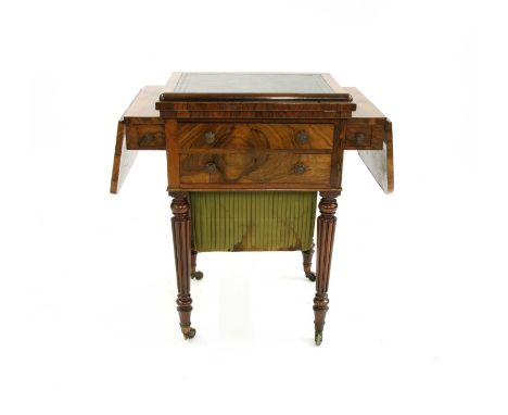 A George IV rosewood worktable, by Gillows of Lancaster, the drop-leaf top with a sliding and ratcheted reading/writing slope