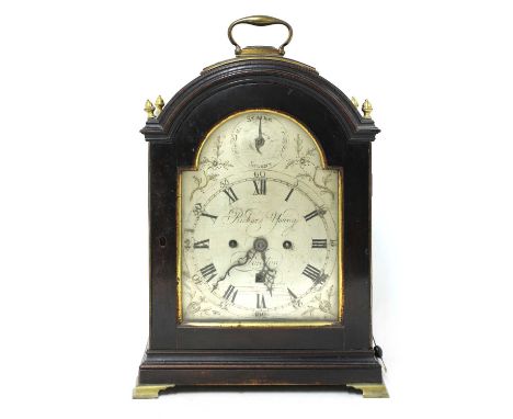 A George III mahogany bracket clock,early 19th century, by Richard Young, London, the case with brass acorn finials, the silv