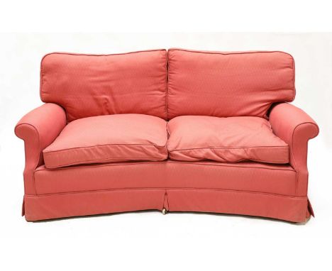 A Lenygon &amp; Morant 'Howard' sofa,20th century, of concave form, with latticed upholstery with a fringe, tapering legs on 