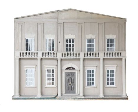 A fine Regency doll's house,c.1810, the painted stone grey exterior in classical style with pitched roof, grand entrance with