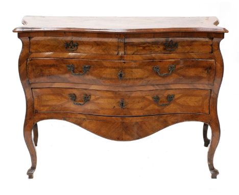 An Italian walnut commode,basically 18th century, of undulating serpentine outline, the top with a moulded edge and scrolling