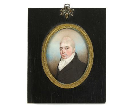 English School, early 19th centuryPortrait of a young gentleman, bust length, in a black coat and white stockminiature on ivo