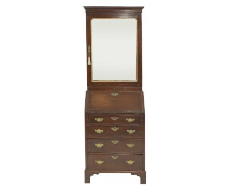 A diminutive George II-style mahogany and parcel-gilt bureau bookcase,incorporating some 18th century elements, the upper sec