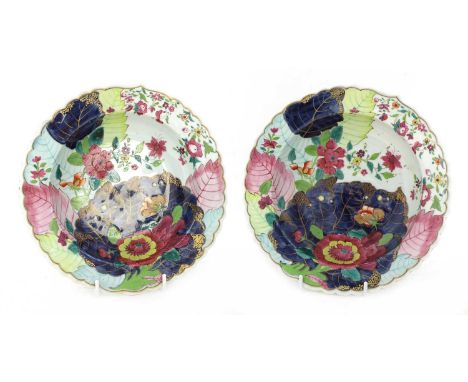 A pair of English pottery 'tobacco leaf' dishes,19th century, in the Chinese-export style, each with gilt-heightened lobed ri