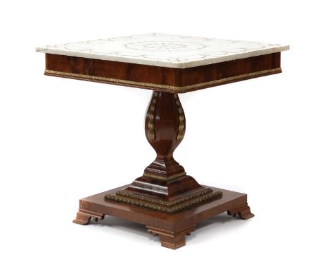 A flame mahogany and parcel-gilt pedestal centre table19th century, Northern European, the square painted white marble top ab