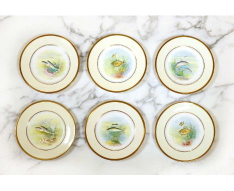 A Minton porcelain fish service, 20th century, painted by L Sumner, consisting of:24 plates, 23cm diameter,2 serving dishes, 