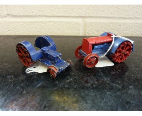 AN UNBOXED DINKY TOYS FARM TRACTOR, No.22e, pre war version, red and blue, with the remains of a similar damaged tractor (2)
