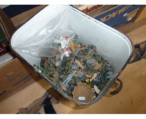 AN ENAMEL BIN CONTAINING A QUANTITY OF ASSORTED PLASTIC SOLDIERS, ANIMALS AND EPHEMERA, to include Cherilea and Kelloggs Spac