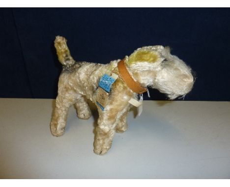 A CHAD VALLEY TERRIER, c.1950's, white fur, length approximately 25cm, height approximately 20cm, some marking and wear, comp