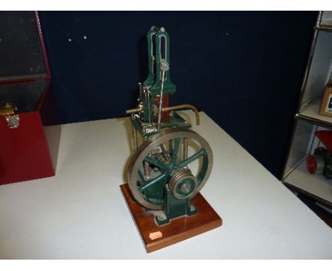 A VERTICAL SINGLE CYLINDER LIVE STEAM ENGINE, not tested, no makers markings, height from floor approximately 39cm