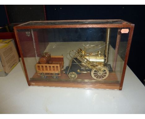 A SCALE MODEL OF STEPHENSON'S ROCKET, of brass, steel and wooden construction, fixed to wooden base, no makers markings, leng