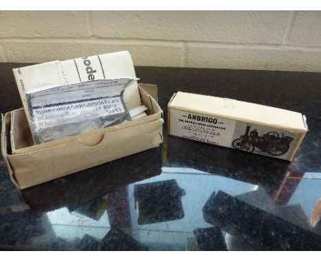A BOXED UNBUILT ANBRICO OO GAUGE WHITE METAL KIT OF A BURRELL ROAD LOCOMOTIVE, with an unbuilt boxed A.B.S. OO Gauge white me