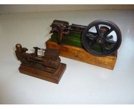 A STUART HORIZONTAL SINGLE CYLINDER LIVE STEAM ENGINE, not tested, length approximately 22cm, mounted on a wooden plinth, tog