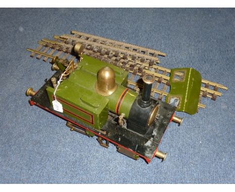 A 3.5' GAUGE LIVE STEAM 0-4-0 TANK LOCOMOTIVE, lined green and black livery, scratch/kit built, no makers markings, brass con