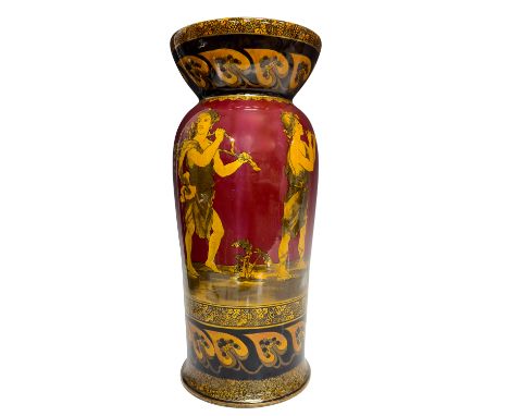 A red and golden glazed vessel featuring a classical motif of young men holding up garlands of grapes and one man playing the