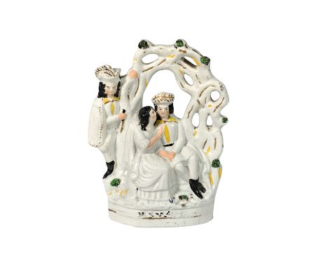 Ceramic gilt figure with colorful detailing, depicting a scene from the play The Rivals, featuring a loving couple sitting un