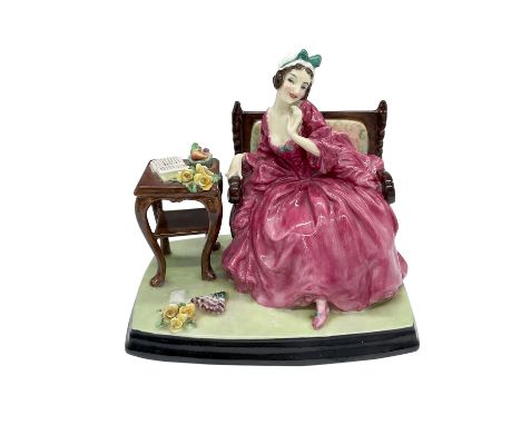 Hand decorated figure of a beauty, in a dark pink gown, seated on a bench. Royal Doulton backstamp. Artist: Leslie HarradineD