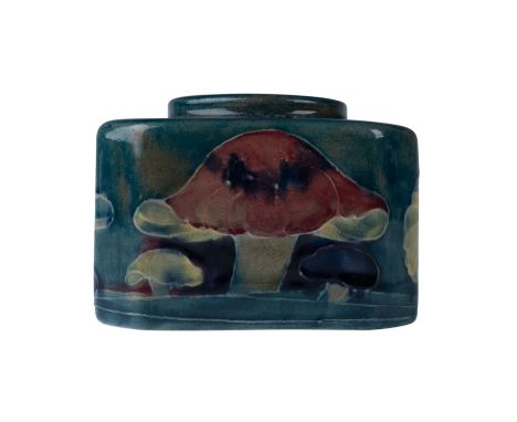 A square-shaped inkwell from Moorcroft Pottery featuring the Claremont pattern. This piece displays an intricate design of mu