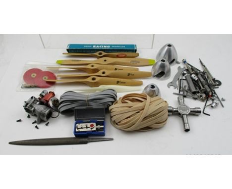 A QUANTITY OF AERO MODEL ENGINEERING ITEMS; includes a de-constructed engine, an Airflow 10-4 and other propellers, aluminium