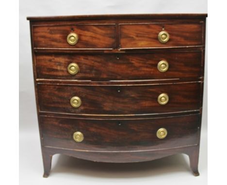 A 19TH CENTURY MAHOGANY BOW FRONTED CHEST of two short over three long drawers, circular brass handles, on outswept bracket f