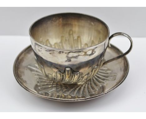 WILLIAM HUTTON AND SONS A LATE VICTORIAN SILVER CUP AND SAUCER with fluted decoration, London 1888, weight 195g 