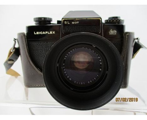 A LEITZ LEICAFLEX SL MOT CAMERA fitted a Leitz Wetzlar No.2079987 Summicron-R 1:2/50 lens in leather case 