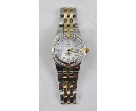A LADY'S BREITLING CHRONOMETER DIAMOND SET STAINLESS STEEL WRIST WATCH, bi-colour with mother of pearl dial and diamond baton