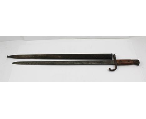 A GERMAN BAYONET WITH WOOD GRIP, 55cm blade, no.35494 with original scabbard no.35494 WWI 