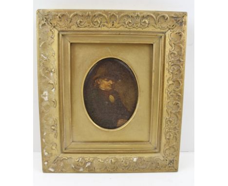 19TH CENTURY BRITISH SCHOOL ''Portrait of a Gentleman, wearing a hat and holding a pen', oil on wooden panel, oval mounted, g