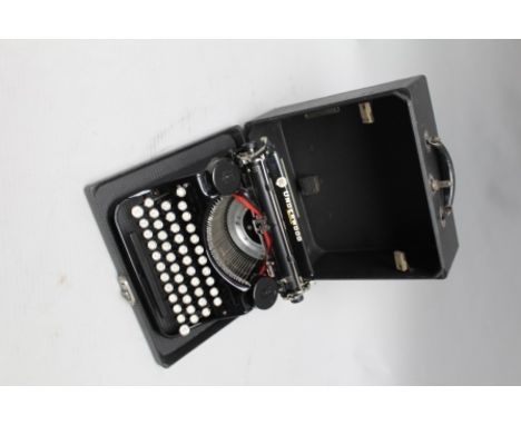 AN 'UNDERWOOD' USA, PORTABLE MANUAL TYPEWRITER with case and spare ribbon spools 