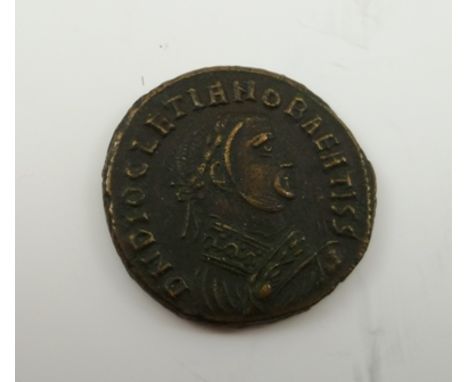 BILLON FOLLIS: DIOCLETIAN, AD 284-305. Rev. Providentia stg. right, extending right hand to Quies. K-P in field. Mint Mark ML