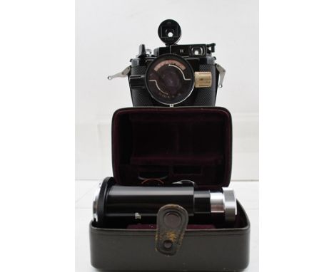 A NIKON, CALYPSO/NIKKOR UNDERWATER CAMERA, fitted a W-Nikkor 1:2.5 f=35mm lens no.317150, together with a leather close-up at