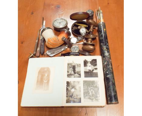 Postcard album, door knobs, meerschaum style pipe, clock and other oddments 
