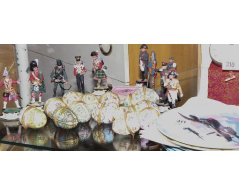10 assorted small soldier figures and 14 Halcyon Days enamel egg ornaments and 6 Coalport plates of Second World War aircraft