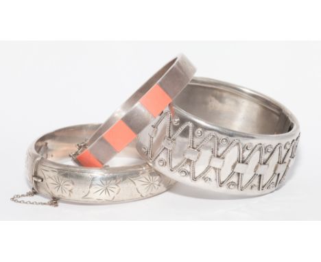 3 ladies silver hinged bangles, one set with coral 