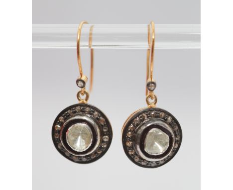 Pair of diamond and black enamel drop earrings set with gold wire hoop fittings 